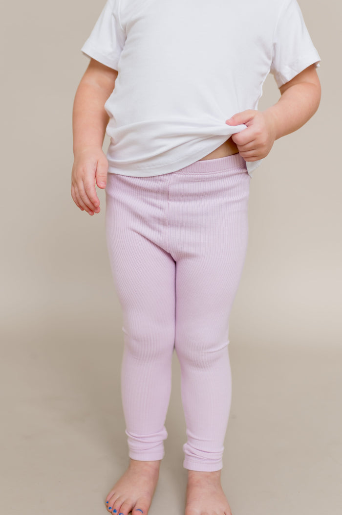 Close up of the Ribbed Leggings in Thistle shown on a young model