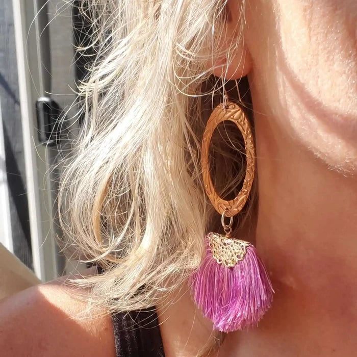 Rose Gold Filigree Silk Tassel Earrings Copper Embossed featuring purple silk tassels and intricate metalwork.