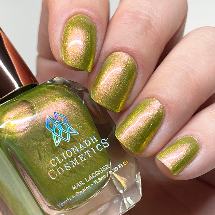 Close up of nails done with Royal Pear Nail Lacquer on fair skin tone.