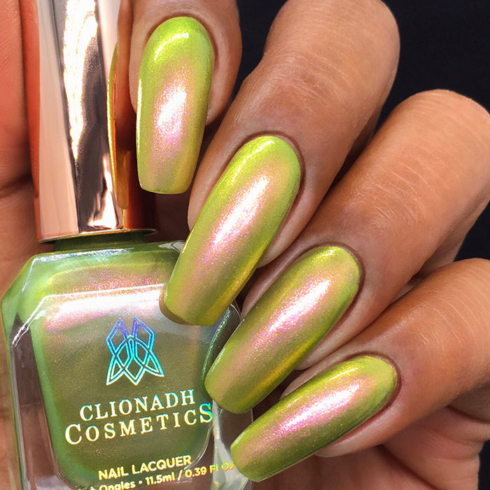 Close up of nails done with Royal Pear Nail Lacquer on medium skin tone.