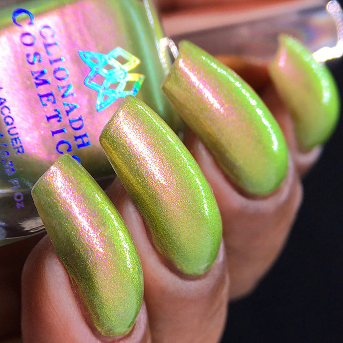 Bottom angled image of nails done with Royal Pear nail lacquer on medium skin tone