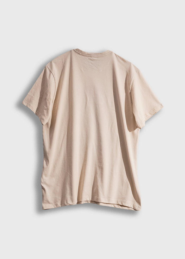 Beige T-shirt displayed on a white background, showcasing its back view and simple design.