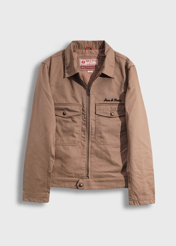 Brown Iron & Resin jacket with front pockets and zipper, displayed on a white background, showcasing its casual design.