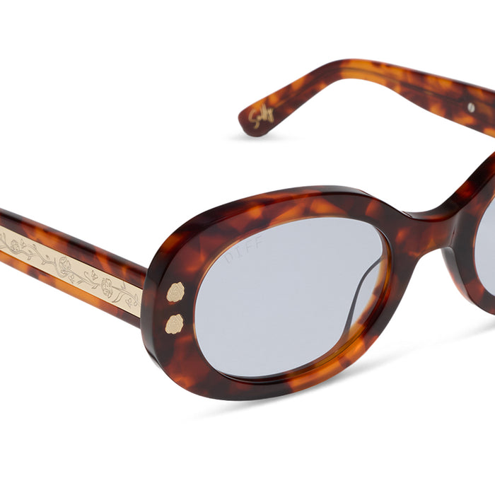 diff eyewear x practical magic 2 featuring the sally oval sunglasses with a tortoise frame and light blue lenses detailed view