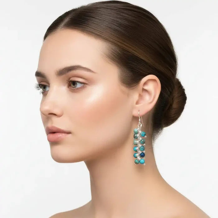 Seen On Jane The Virgin Silver Turquoise Wire Coil Earrings worn by a model showcasing bohemian elegance.