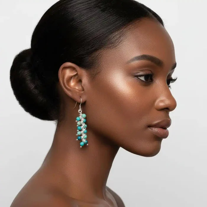 Seen On Jane The Virgin Silver Turquoise Wire Coil Earrings worn by a model showcasing elegant design.