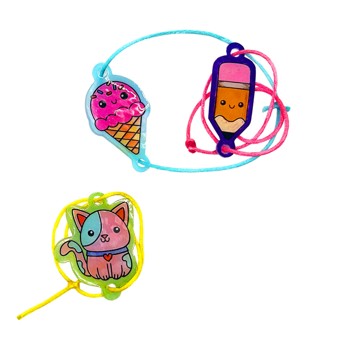 Finished ice cream, pencil and cat bracelets from OOLY Shrink-its! DIY Shrink Art Bracelet Kit - BFF