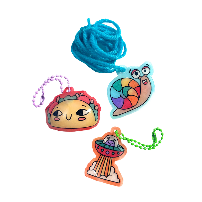 Finished charms of taco, snail and UFO from Shrink-its! DIY Shrink Art Kit - Fun Friends