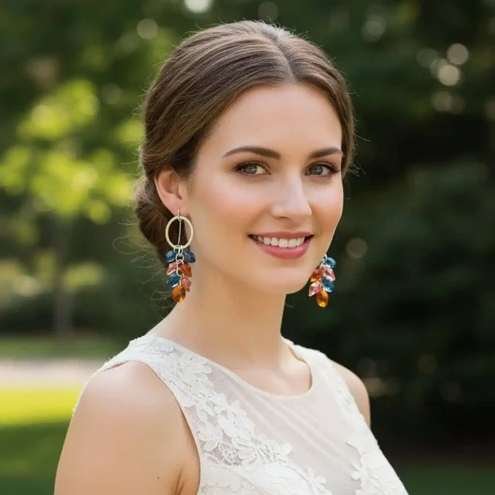 Silver Circle Multi Color Crystal Drop Dangle Earrings worn by a smiling woman in natural light