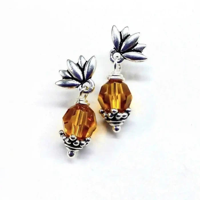 Silver Crystal Pineapple Steel Studded Earrings with topaz crystal design and silver pineapple accents