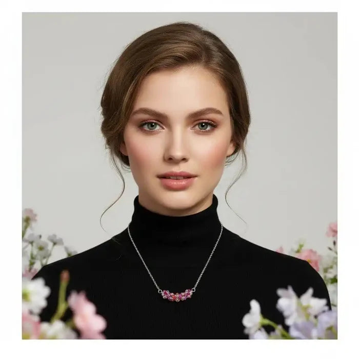 Model wearing a Silver Multi Color Spring Blossom Crystal Necklace surrounded by spring flowers.