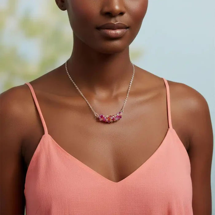 Silver Multi Color Spring Blossom Crystal Necklace showcased on a model wearing a pink top, emphasizing elegant design and colors.