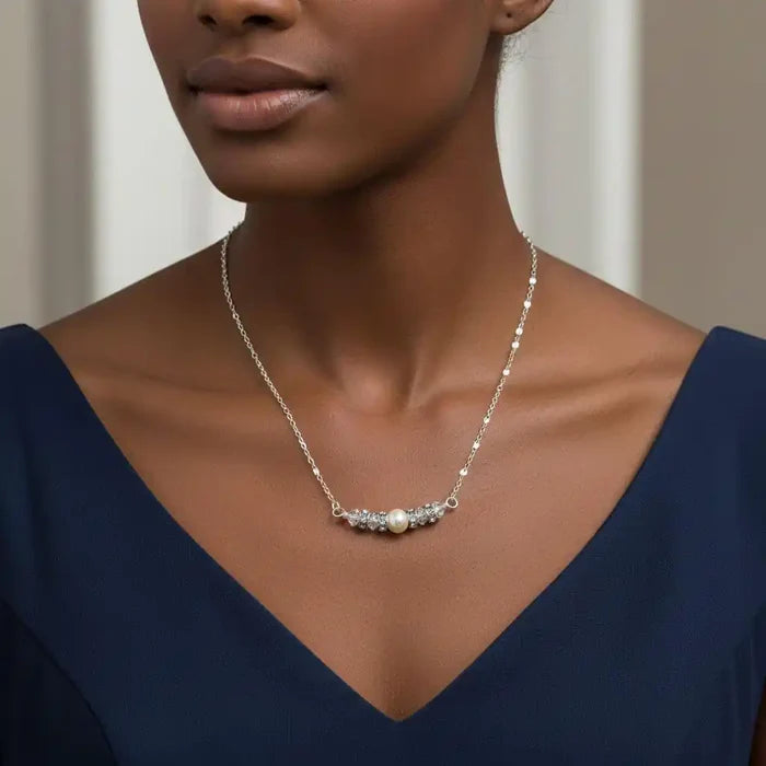 Silver Swarovski Crystal Pearl Bar Bridal Necklace worn elegantly by a model, showcasing its exquisite design.