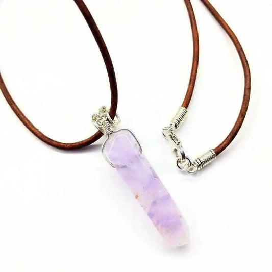 Silver Wrapped Light Amethyst Point Gemstone Necklace on a brown leather cord with a crystal pendant.