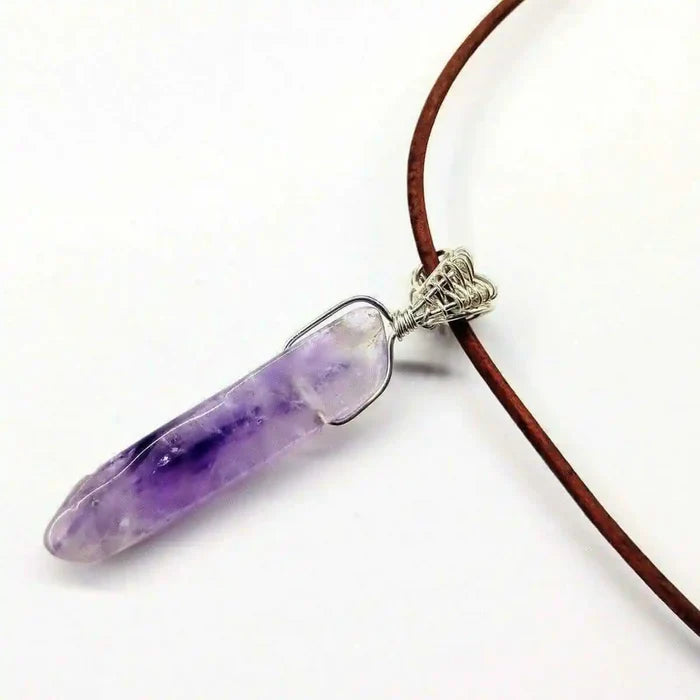 Silver Wrapped Light Amethyst Point Gemstone Necklace featuring a light purple amethyst crystal pendant.