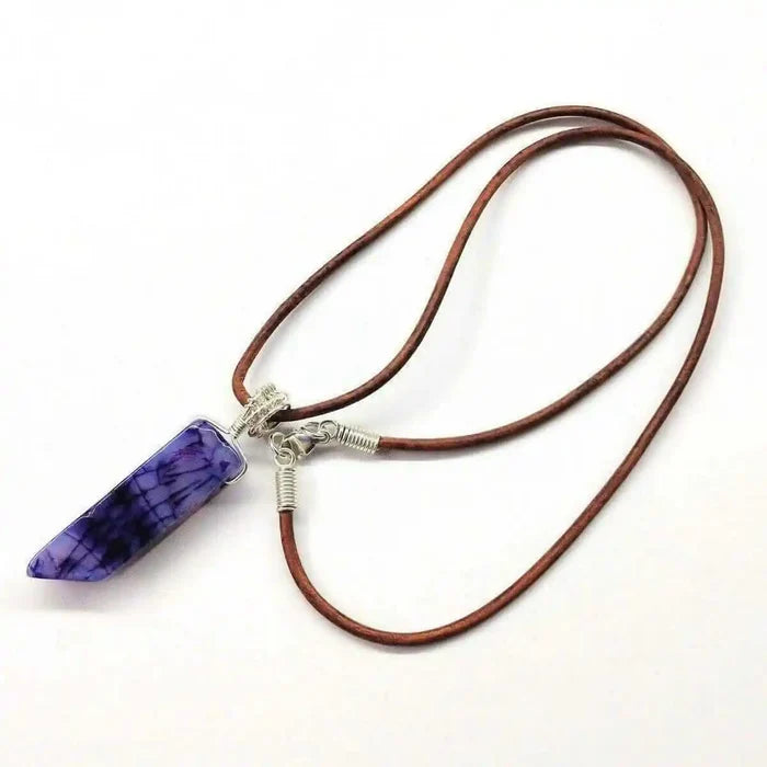 Silver Wrapped Purple Dyed Crackle Agate Point Necklace on a brown leather cord, showcasing vibrant purple hues.
