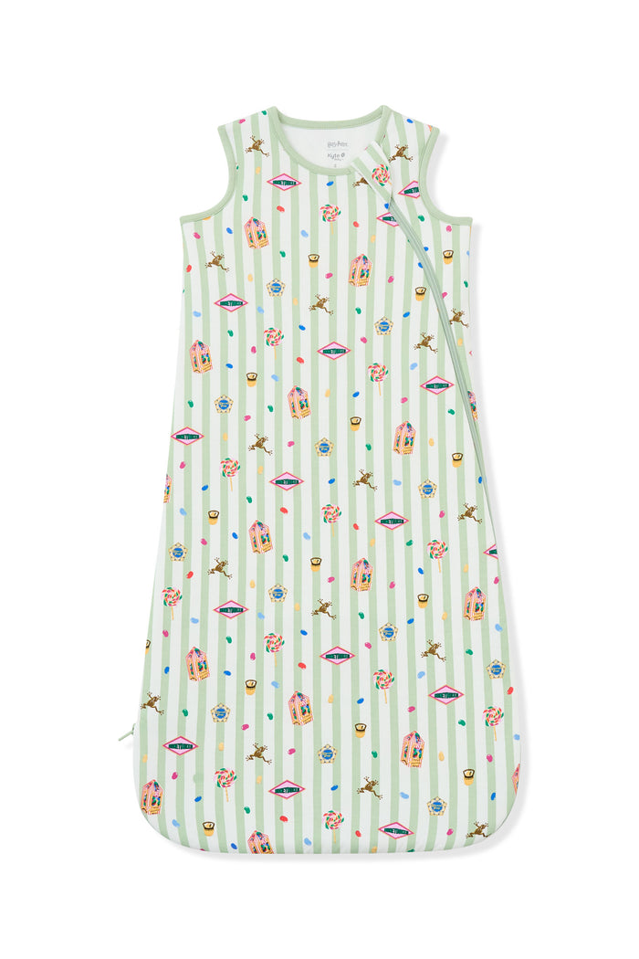Green and white striped sleep bag with colorful Harry Potter patterns on a white background