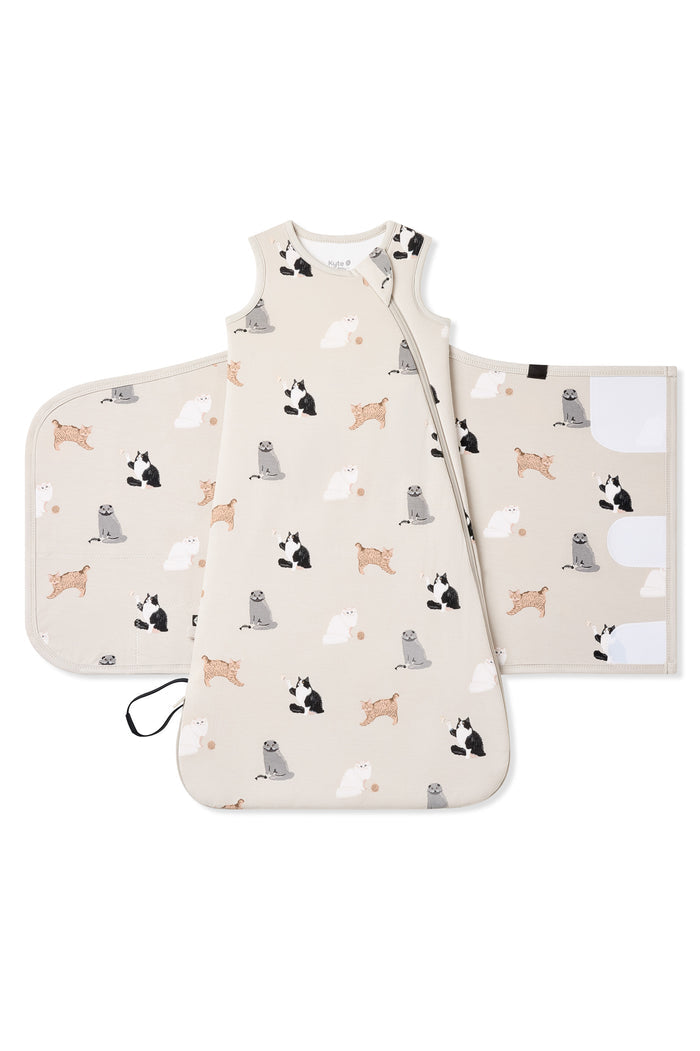 Sleep Bag Swaddler in Fluffy Cat 1.0 shown unswaddled on a white surface