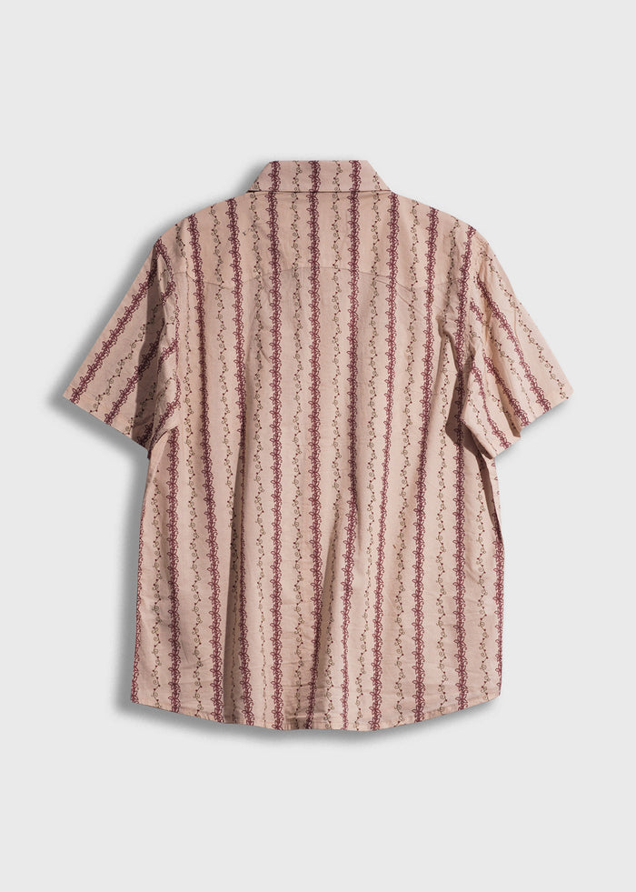 Back view of a short-sleeve beige shirt with maroon vertical stripes and intricate patterns on a plain white background.