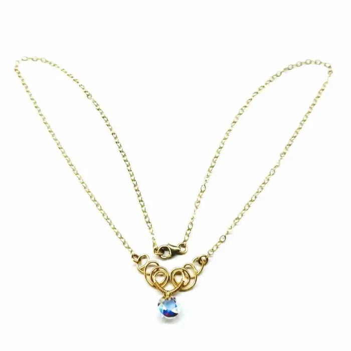 Sparkly Crystal AB Wire Sculpted 14 KT Gold Filled Necklace with gold chain and crystal pendant.