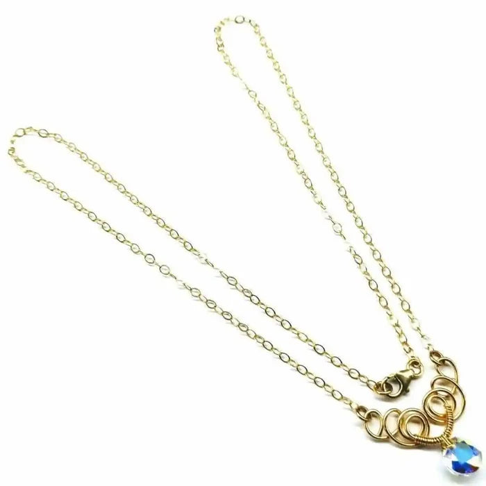Sparkly Crystal AB Wire Sculpted 14 KT Gold Filled Necklace featuring elegant wire design and crystal charm.