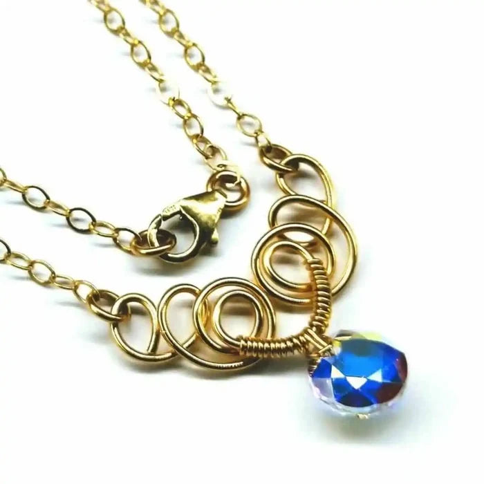 Sparkly Crystal AB Wire Sculpted 14 KT Gold Filled Necklace with unique wire design and colorful crystal pendant.