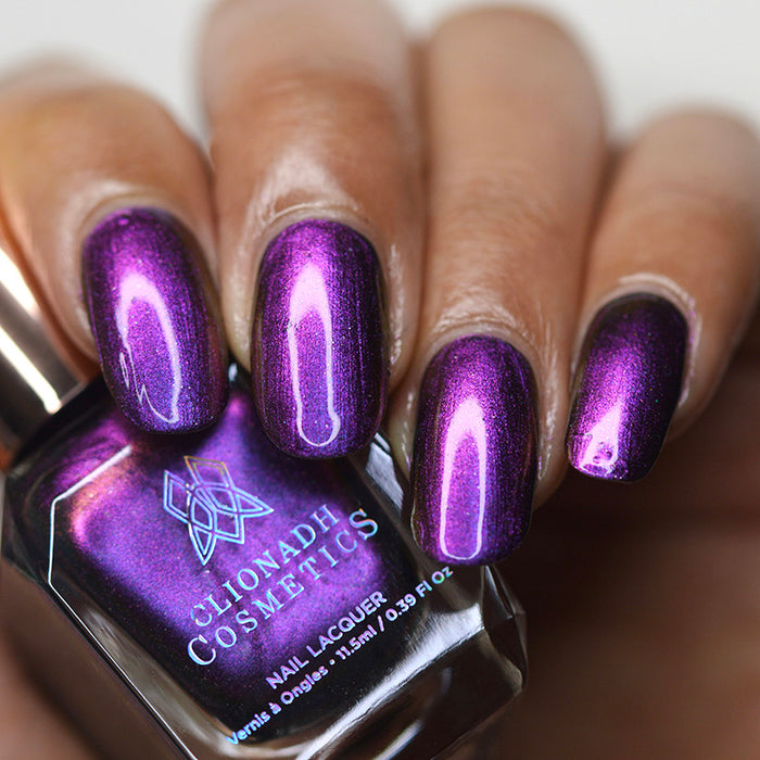 Close up of nails done with Flame-Blown nail lacquer on medium skin tone.