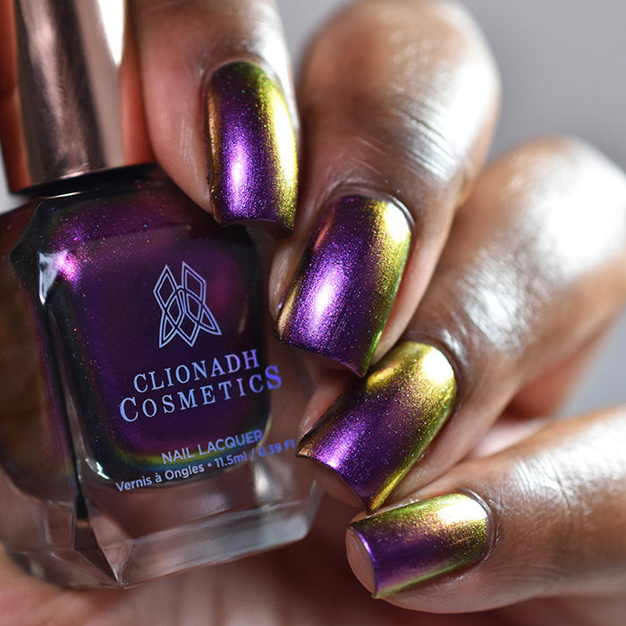 Close up of nails done with Flame-Blown nail lacquer on deep skin tone.
