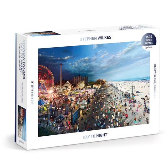 The Stephen Wilkes Day To Night Coney Island 1500 Piece Puzzle by Stephen Wilkes captures Coney Island’s vibrant beach and amusement park scene as it transitions from day to night.