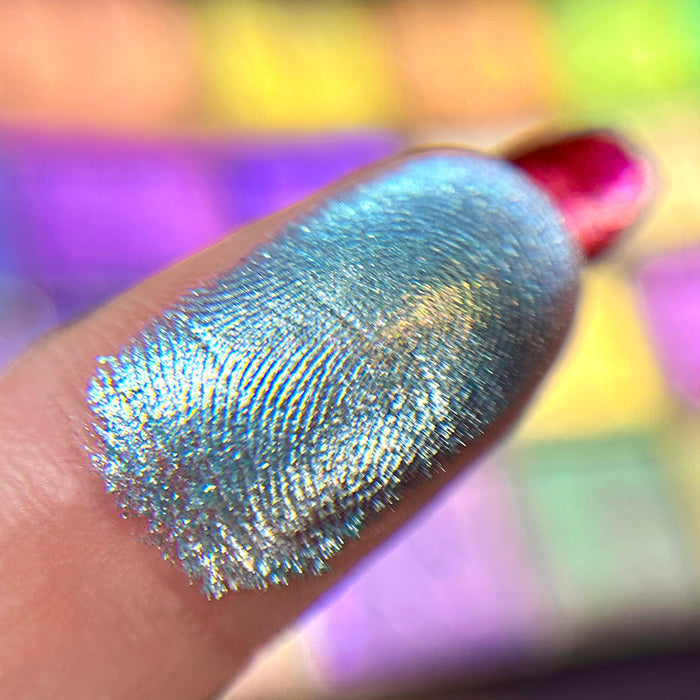 Macro finger swatch of Sterling Electric Multichrome Eyeshadow.