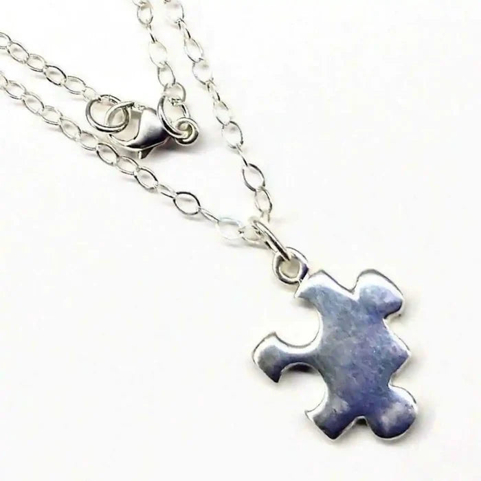 Sterling Silver Autism Awareness Puzzle Piece Chain Necklace featuring a hand-stamped puzzle piece pendant.