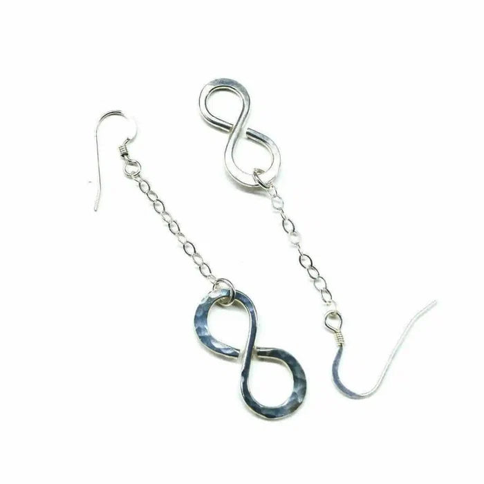 Sterling Silver Hammer Patterned Infinity Earrings with a unique handmade design and bold, shiny finish.