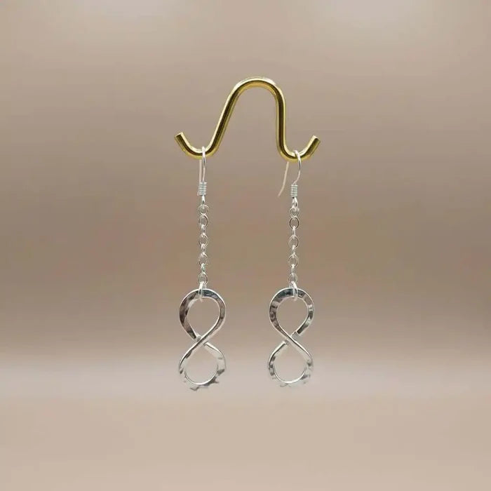 Sterling Silver Hammer Patterned Infinity Earrings showcasing the elegant infinity symbol with a hammer texture.