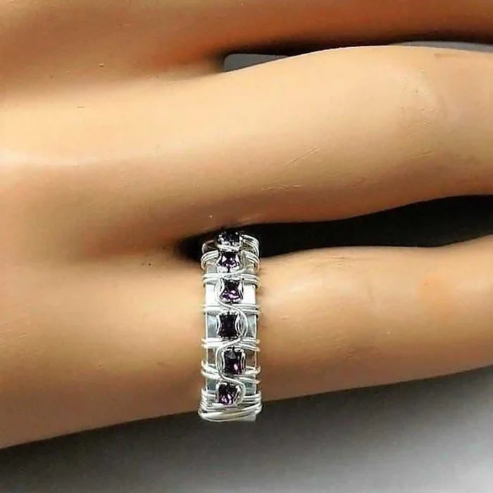 Sterling Silver Hammered Amethyst Rhinestone Bling Ring showcased on a model's hand.