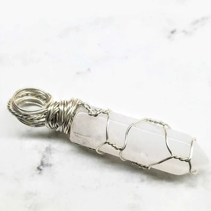 Sterling Silver Messy Wire Wrap Gemstone Crystal Pendant showcasing its unique wire-wrapped design and clear crystal.