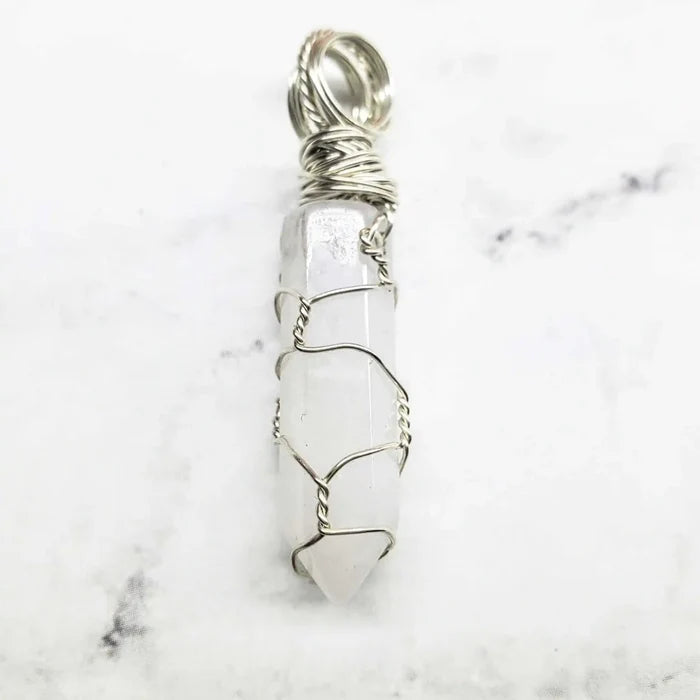 Sterling Silver Messy Wire Wrap Gemstone Crystal Pendant featuring a unique wire-wrapped design with a crystal.
