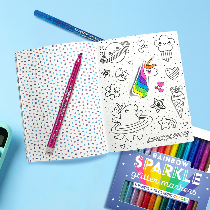 Opened Stickiville Color-In’ Sticker Book: Cute-A-Licious Doodles with colored unicorn sticker and Rainbow Sparkle markers