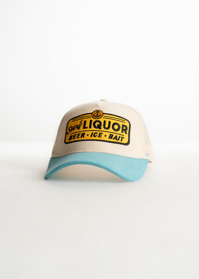 Beige and blue cap with "Surf Liquor Beer Ice Bait" logo on front, isolated on a white background.