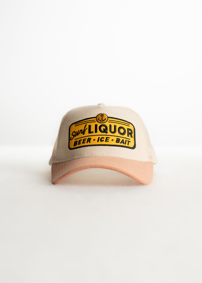 Beige cap with "Surf Liquor" logo in yellow and black, featuring "Beer, Ice, Bait" text. Simple design on white background.