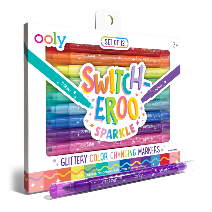 Quarter angle of packaging and purple pen from OOLY Switch-Eroo Sparkle Glittery Color Changing Markers
