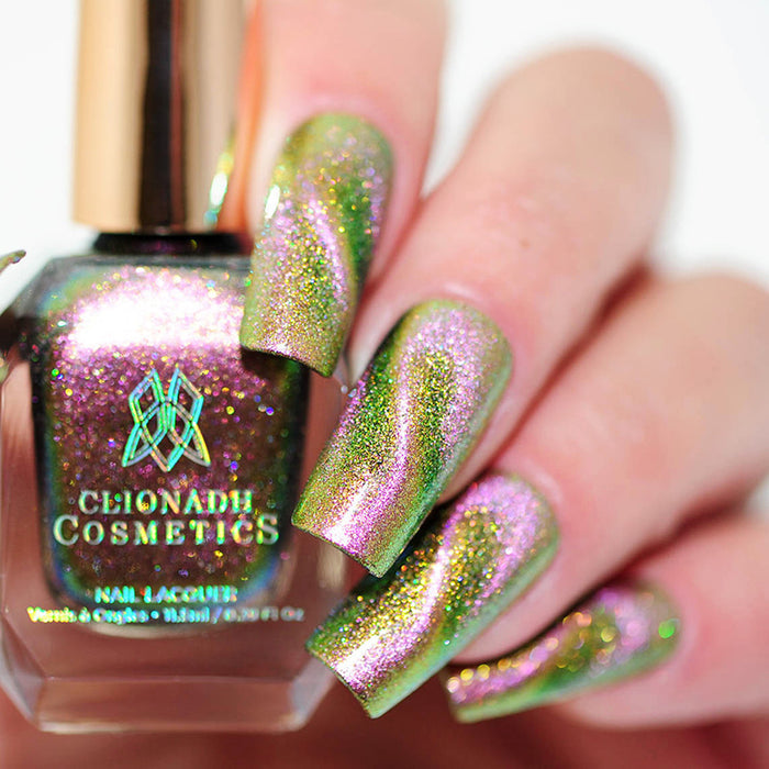 Close up of nails done with Synesthesia nail lacquer featuring a design to show off the magnetic effect on fair skin tone.