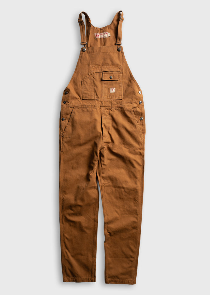 Brown work overalls with adjustable straps, front pocket, and button details, laid flat on a light background.