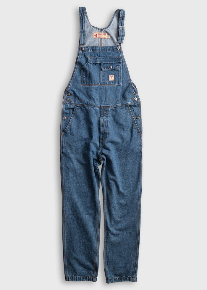 Blue denim overalls with adjustable straps and multiple pockets, laid flat on a white background, showcasing casual style.