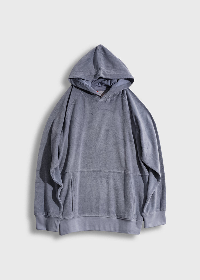 Gray hooded sweatshirt on a white background, featuring a relaxed fit and soft texture, with visible seams and a front pocket.