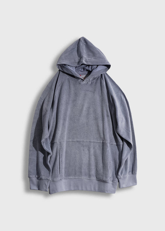 Gray hooded sweatshirt on a white background, featuring a relaxed fit and soft texture, with visible seams and a front pocket.