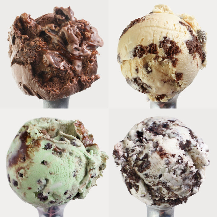 Photo of 4 different ice cream flavors on ice cream scoopers