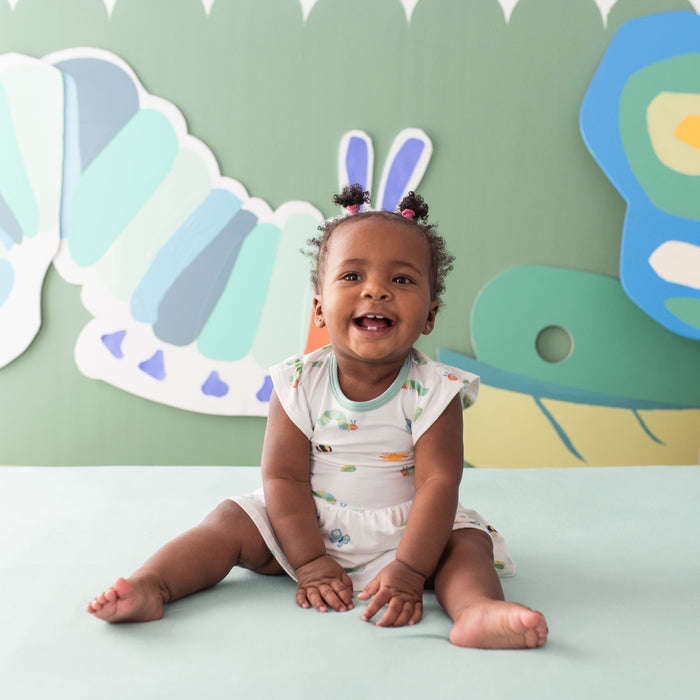 Toddler wearing Twirl Bodysuit Dress in The Very Hungry Caterpillar™ and Friends