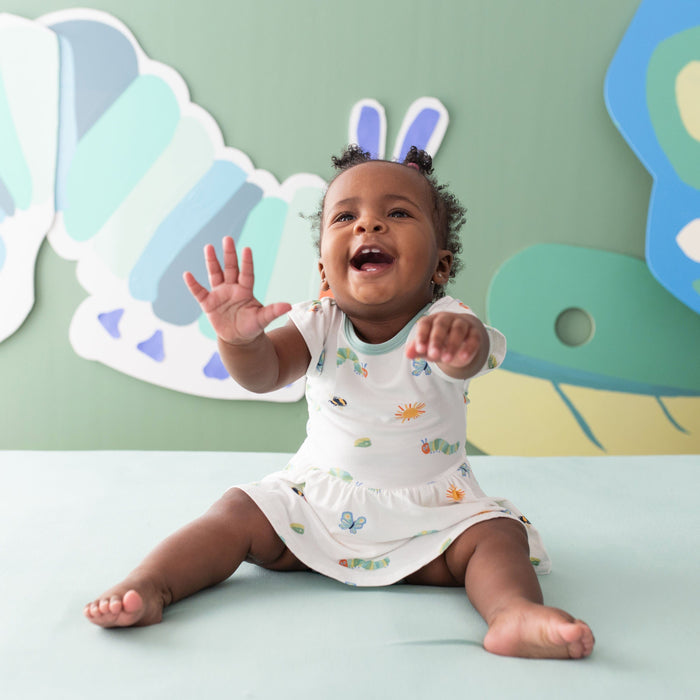 Child wearing Bamboo Twirl Bodysuit Dress in The Very Hungry Caterpillar™ and Friends