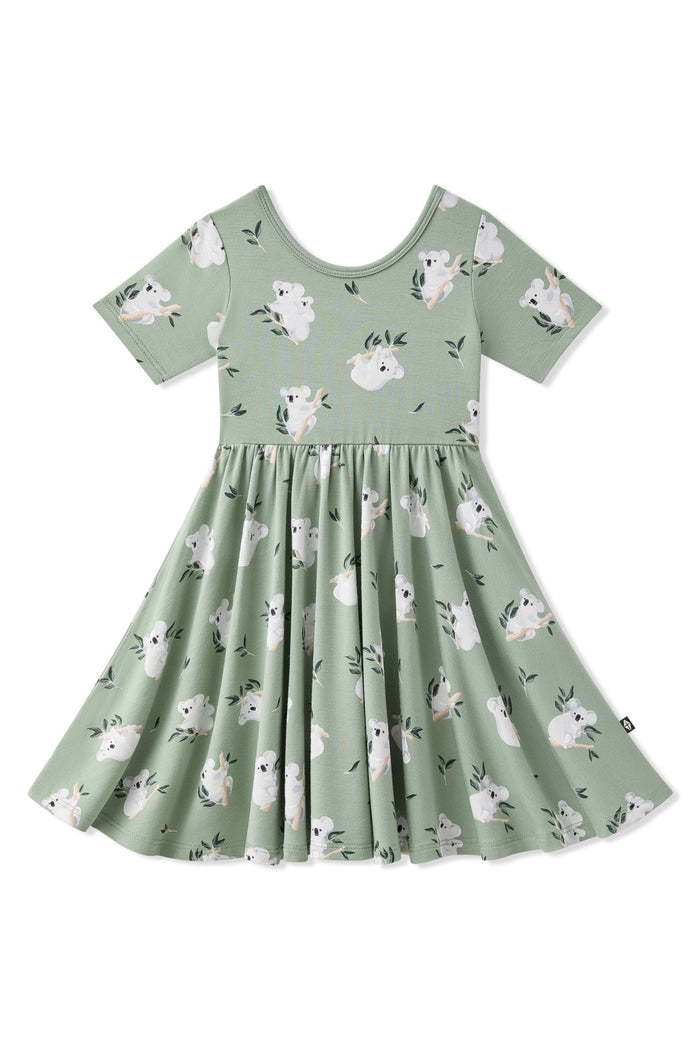Product photo of the Twirl Dress in Koala on a white surface