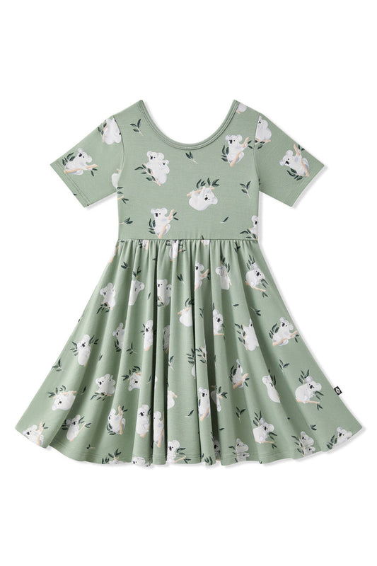 Product photo of the Twirl Dress in Koala on a white surface